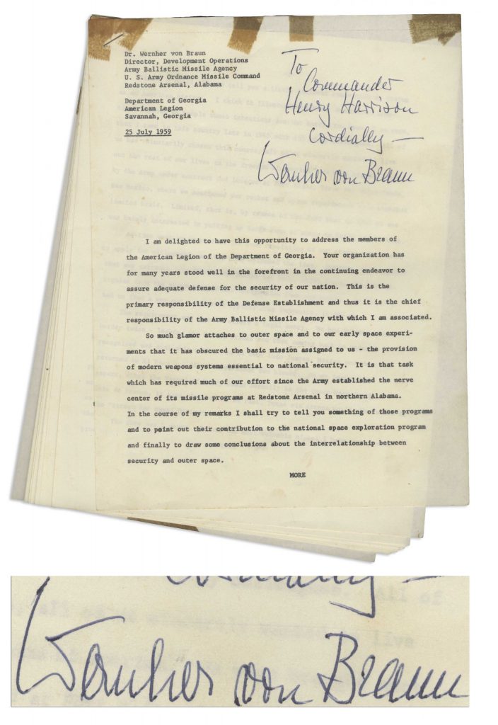 Typed document secured with a staple on top left corner. Wernher von Braun signs near top right of first page.