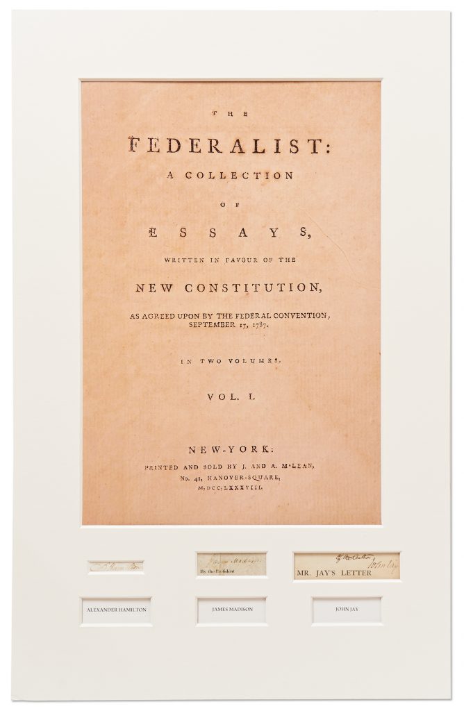 Copy of "The Federalist Papers" matted with signatures of Alexander Hamilton, John Jay and James Madison below.