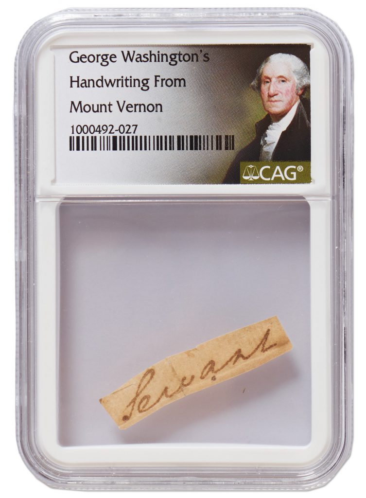 Encapsulated slip of paper with "servant" written by George Washington.