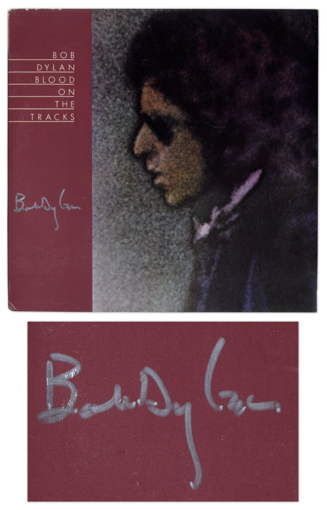 Grainy profile image to Bob Dylan wearing sunglasses. Dylan signs along left margin in silver.