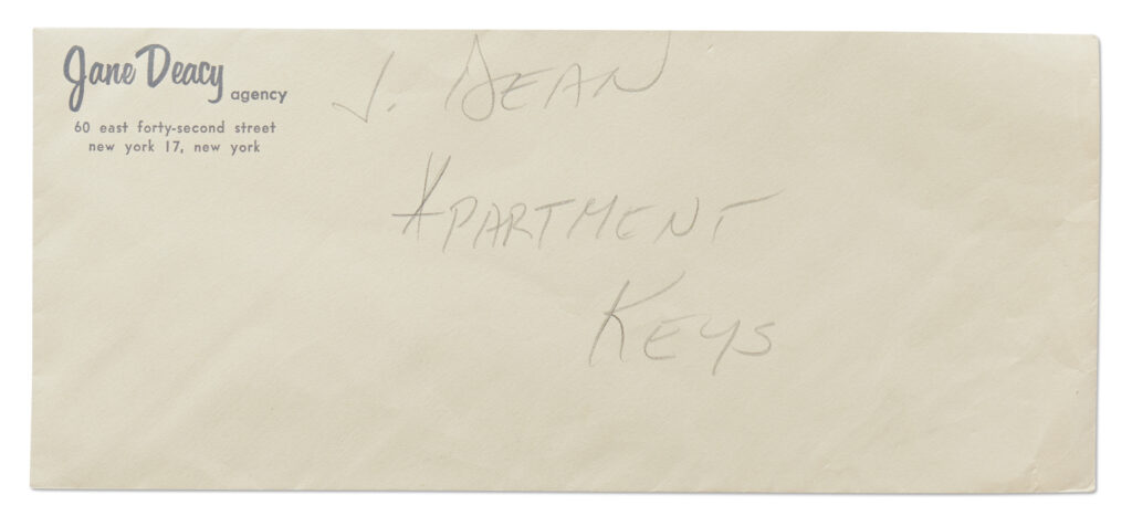 White envelope from Jane Deacy agency has "J. DEAN APARTMENT KEYS" written in pencil